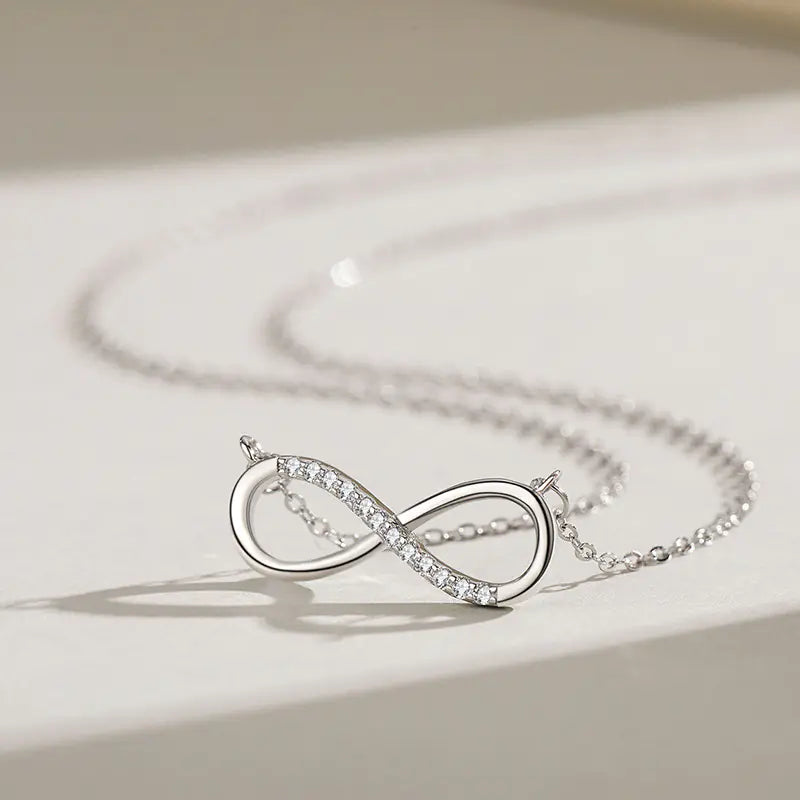 Infinity Bond Necklace on a light background