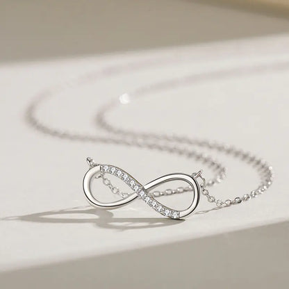Infinity Bond Necklace on a light background